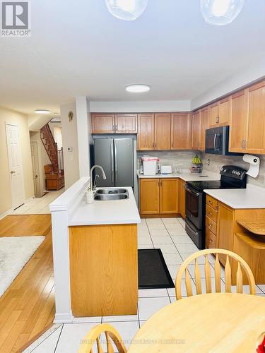 4490 Victory Court, Burlington, ON - Indoor Photo Showing Kitchen With Double Sink