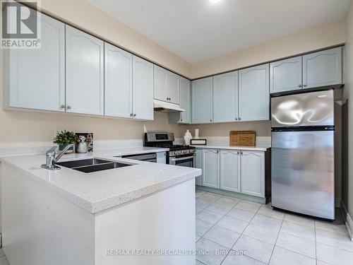 25 Commodore Drive, Brampton, ON - Indoor Photo Showing Kitchen With Double Sink