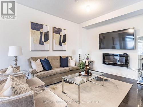 119 Fruitvale Circle, Brampton, ON - Indoor Photo Showing Living Room With Fireplace