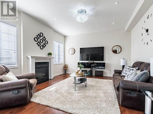 18 Yarmouth Street, Brampton, ON - Indoor Photo Showing Living Room With Fireplace