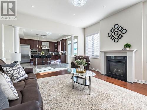 18 Yarmouth Street, Brampton, ON - Indoor Photo Showing Living Room With Fireplace