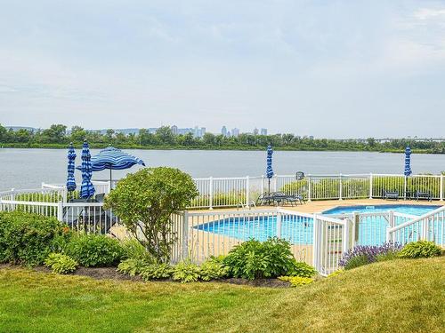 Piscine - 2B-8480 Rue St-Charles, Brossard, QC - Outdoor With In Ground Pool With View