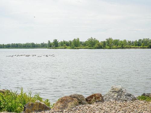 ExtÃ©rieur - 2B-8480 Rue St-Charles, Brossard, QC - Outdoor With Body Of Water With View