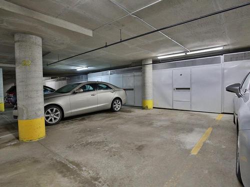 Garage - 2B-8480 Rue St-Charles, Brossard, QC - Indoor Photo Showing Garage