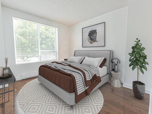 Chambre Ã Â coucher - 2B-8480 Rue St-Charles, Brossard, QC - Indoor Photo Showing Bedroom