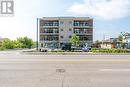 202 - 310 Broadway Avenue, Orangeville, ON  - Outdoor With Facade 