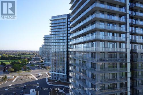 1108 - 2560 Eglinton Avenue W, Mississauga, ON - Outdoor With Balcony With Facade