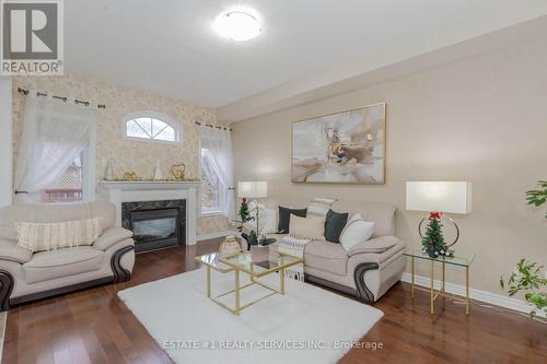 61 Oblate Crescent, Brampton, ON - Indoor Photo Showing Living Room With Fireplace