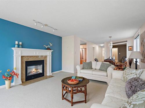 5B-9851 Second St, Sidney, BC - Indoor Photo Showing Living Room With Fireplace