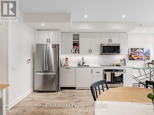 122 - 251 Manitoba Street, Toronto, ON - Indoor Photo Showing Kitchen With Stainless Steel Kitchen