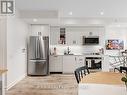 122 - 251 Manitoba Street, Toronto, ON  - Indoor Photo Showing Kitchen With Stainless Steel Kitchen 