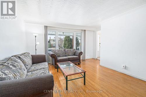 17 Vange Crescent, Toronto, ON - Indoor Photo Showing Living Room