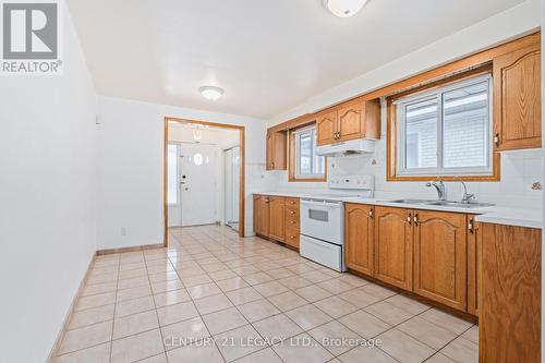 17 Vange Crescent, Toronto, ON - Indoor Photo Showing Kitchen With Double Sink