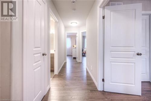 Hallway with wood-type flooring - 66 Lock Street, Innerkip, ON - Indoor Photo Showing Other Room