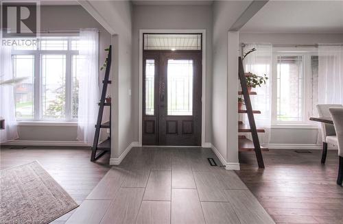 Foyer with wood-type flooring - 66 Lock Street, Innerkip, ON - Indoor Photo Showing Other Room