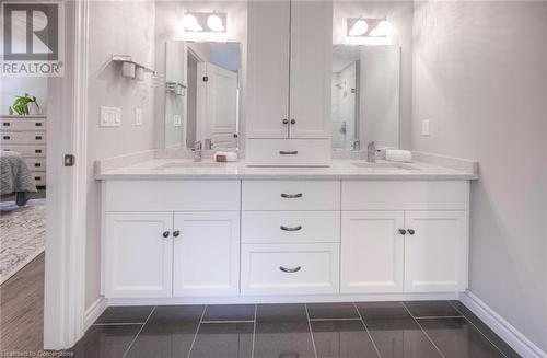 Bathroom featuring tile patterned flooring and vanity - 66 Lock Street, Innerkip, ON - Indoor Photo Showing Bathroom