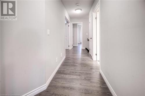 Corridor with wood-type flooring - 66 Lock Street, Innerkip, ON - Indoor Photo Showing Other Room