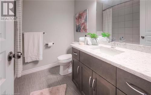 Bathroom with vanity and toilet - 66 Lock Street, Innerkip, ON - Indoor Photo Showing Bathroom