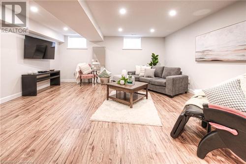 Living room featuring light hardwood / wood-style floors - 66 Lock Street, Innerkip, ON - Indoor Photo Showing Other Room