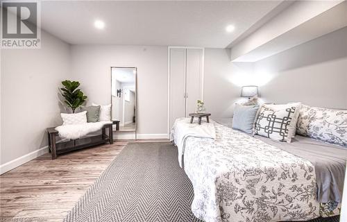 Bedroom featuring wood-type flooring - 66 Lock Street, Innerkip, ON - Indoor Photo Showing Bedroom