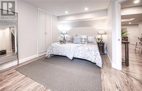 Bedroom with hardwood / wood-style flooring - 66 Lock Street, Innerkip, ON - Indoor Photo Showing Bedroom