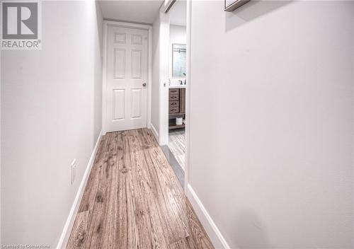 Hall featuring hardwood / wood-style floors - 66 Lock Street, Innerkip, ON - Indoor Photo Showing Other Room