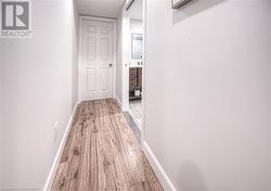 Hall featuring hardwood / wood-style floors - 