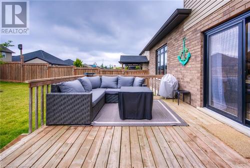 Wooden terrace featuring area for grilling and an outdoor living space - 66 Lock Street, Innerkip, ON - Outdoor With Deck Patio Veranda With Exterior