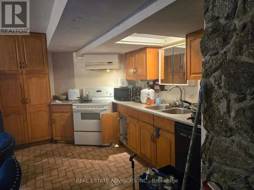 17 Macduff Crescent, Toronto, ON - Indoor Photo Showing Kitchen With Double Sink