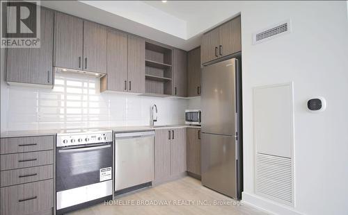 #1007 - 50 George Butchart Drive, Toronto, ON - Indoor Photo Showing Kitchen With Upgraded Kitchen