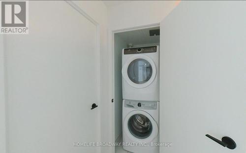 #1007 - 50 George Butchart Drive, Toronto, ON - Indoor Photo Showing Laundry Room