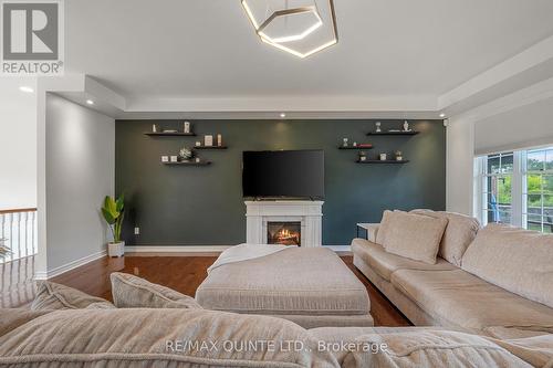 107 Country Charm Drive, Belleville, ON - Indoor Photo Showing Living Room With Fireplace