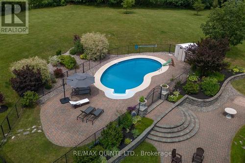 107 Country Charm Drive, Belleville, ON - Outdoor With In Ground Pool