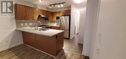 2Fl 6828 Eckersley Road, Richmond, BC - Indoor Photo Showing Kitchen With Double Sink