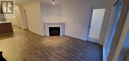 2Fl 6828 Eckersley Road, Richmond, BC - Indoor Photo Showing Living Room With Fireplace