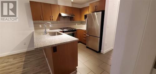 2Fl 6828 Eckersley Road, Richmond, BC - Indoor Photo Showing Kitchen With Upgraded Kitchen