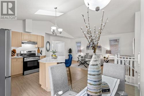 Breakfast Bar PLUS Dining Area - 223 Crimson Crescent, London, ON - Indoor Photo Showing Kitchen