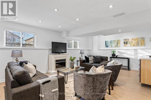 Huge, Bright 3rd Level Family Room - 223 Crimson Crescent, London, ON - Indoor Photo Showing Living Room With Fireplace