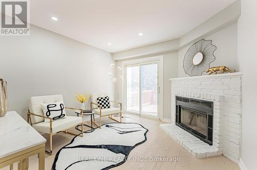 85 River Grove Drive, Toronto, ON - Indoor Photo Showing Living Room With Fireplace