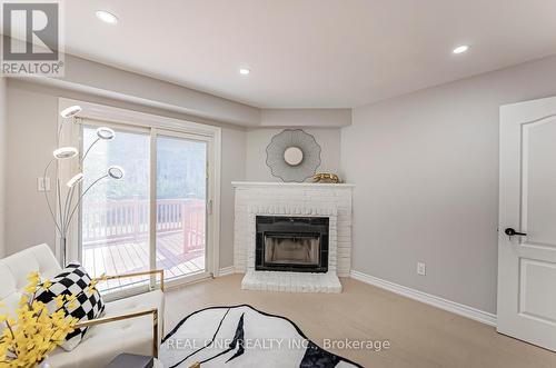 85 River Grove Drive, Toronto, ON - Indoor Photo Showing Living Room With Fireplace