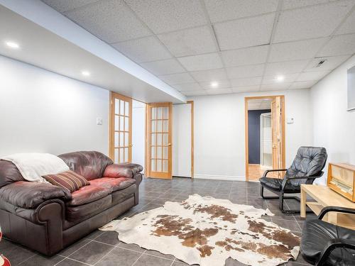 Family room - 142 Rue De Callières, Saint-Bruno-De-Montarville, QC - Indoor Photo Showing Basement