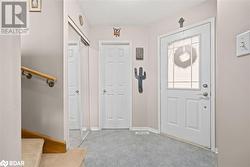 Entryway featuring a textured ceiling - 