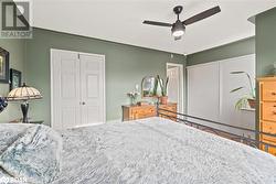 Bedroom featuring ceiling fan - 