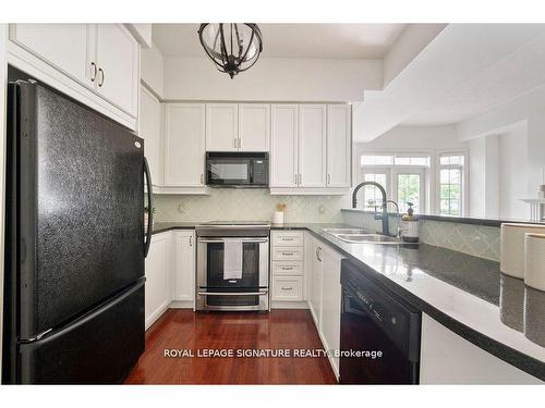 Th9-1 Rean Dr, Toronto, ON - Indoor Photo Showing Kitchen With Double Sink