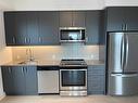 3001-8 Nahani Way, Mississauga, ON  - Indoor Photo Showing Kitchen With Upgraded Kitchen 