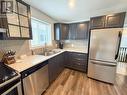 364 Spruce Street N, Timmins (Tne - Hill District), ON  - Indoor Photo Showing Kitchen With Double Sink 