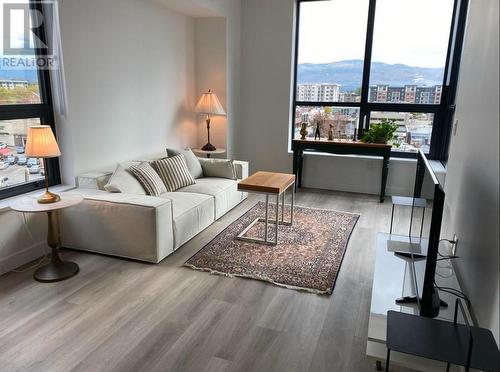 REAL FURNITURE in the home now! - 1488 Bertram Street Unit# 605, Kelowna, BC - Indoor Photo Showing Living Room