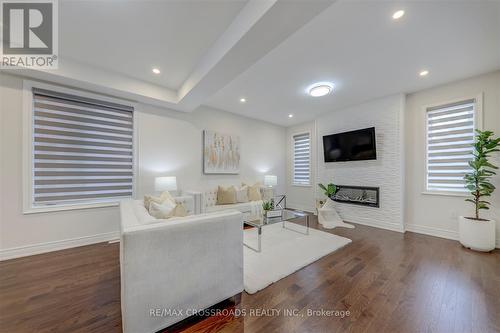 132 Carriage Shop Bend, East Gwillimbury, ON - Indoor Photo Showing Living Room With Fireplace