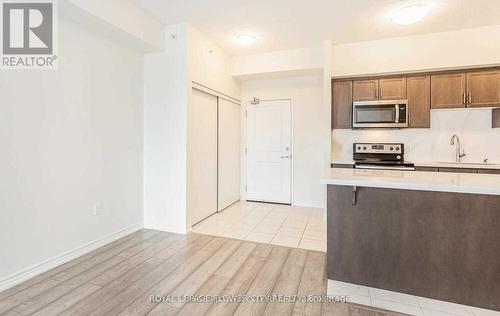 313 - 640 Sauve Street, Milton, ON - Indoor Photo Showing Kitchen