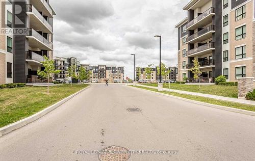 313 - 640 Sauve Street, Milton, ON - Outdoor With Facade